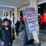 Employees picket a Macy's store in Tukwila, Wash., demanding higher pay and more security against retail thieves.