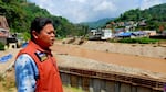 Bundit Pantarakon, a local businessman and city council member in Mae Sai, Thailand, looks over the Sai River.