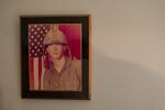 A photo of O'Connor in uniform during the 1970s hangs on the wall.