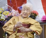 Kane Tanaka, born in 1903, smiles as a nursing home celebrates three days after her 117th birthday in Fukuoka, Japan, on Jan. 5, 2020.