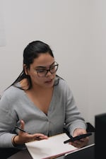 While most people need rent help, Juarez says that's not always the most urgent problem. She's used the allocated money for payday loan debt, appliances, laptops and, recently, an e-bike for someone whose mental illness made it difficult to take public transportation.