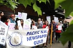 Reporters from The Tacoma News Tribune and Olympian rallied in downtown Tacoma as part of a daylong strike on Tuesday, May 26, 2026.