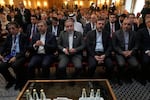 Iranian Foreign Minister Abbas Araghchi, center, attends a conference titled "International Law Under Assault: Aggression and Self-Defense," in Tehran, Iran, Sunday, Nov. 16, 2025.