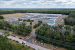 An aerial view of activists rallying at the North Lake Processing Center.