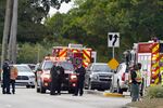 Law enforcement officers block an area where a shooting wounded several FBI while serving an arrest warrant, Tuesday, Feb. 2, 2021, in Sunrise, Fla.