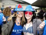 Snaking around the basketball arena hours before doors opened, supporters carried signs, while Sanders' campaign staff asked for volunteers and others handed around petitions.