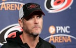 FILE - In this May 9, 2018, file photo, Carolina Hurricanes owner and CEO Tom Dundon takes questions during an NHL hockey news conference in Raleigh, N.C.
