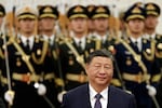 Chinese leader Xi Jinping reviews the honor guard at the Great Hall of the People in November in Beijing.