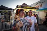 Nicole Georges and Rocco Kayiatos in front of Cena Vegan, a vegan pop-up in Highland Park, California. 