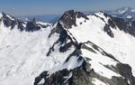 A view of glacier-clad peaks in Washington’s North Cascades. Snow in Idaho, western Montana, the Washington Cascades and Snake River Basin melted two to five weeks earlier than normal in 2026, and in parts of the Oregon Cascades, mountain snowpack melted two months earlier than normal, according to Washington’s state climatologist.