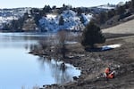 Field technicians with Resource Environmental Solutions doing revegetation work along Iron Gate Reservoir in Feb. 2023.