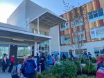 Students gather in front of Kellogg Middle School on September 1, 2021. The school is one of two newly opened in Portland Public Schools.