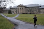 People walk on the campus of Cornell University in Ithaca, N.Y., in 2024.