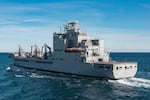 In this image provided by the U.S. Navy, the John Lewis-class replenishment oiler USNS Harvey Milk (T-AO-206) conducts a replenishment at sea in the Atlantic Ocean, Dec. 13, 2024.