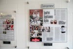 Printed news articles line the entryway of Tan Tan Café and Delicatessen in Beaverton, Ore., June 13, 2025. Tan Tan was founded by Vinh Tran and Hongmai Nguyen, and is now also managed by their daughter Lisa Tran.