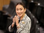 Paetongtarn Shinawatra, leader of Pheu Thai Party and daughter of Thailand's former Prime Minister Thaksin Shinawatra, smiles before a news conference in Bangkok on Thursday.