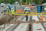 Construction jobs are a historically white, male dominated field. A crew works on the Hall Boulevard overpass in Beaverton on May 23, 2024. 