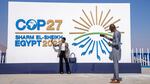 A Chadian poses for a photograph at the entrance of the COP27 U.N. Climate Summit on Sunday in Sharm el-Sheikh, Egypt.