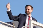 Vice President JD Vance gives a thumb up sign as he boards Air Force Two after attending talks on Iran in Islamabad, Pakistan, Sunday, April 12, 2026.