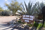A sign of support from Nancy Guthrie's neighbors stands near her driveway in the Tucson, Ariz., area. The 84-year-old grandmother was last seen by her family on Jan. 31.