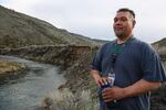 Warm Springs water treatment plant engineer Ron Palmer stands by the ox bow, a side channel dug into the Deschutes River, where surface water is collected for treatment on Friday, March 29, 2019, in Warm Springs, Ore.