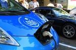 A Nissan Leaf is charging in a demonstration of PSU's new "Electric Avenue."