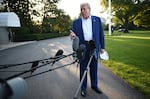 President Trump speaks to the press before boarding Marine One from the South Lawn of the White House on July 24 to attend the NATO leaders' summit in The Hague.