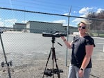 Heather Muth leads a small group of activists documenting twice-weekly ICE deportation flights.