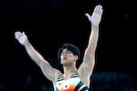 Daiki Hashimoto, of Japan, celebrates after performing on the pommel horse during the men's artistic gymnastics team finals round at Bercy Arena at the 2024 Summer Olympics, Monday, July 29, 2024, in Paris, France.