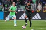 FILE — Portland Timbers forward Antony moves the ball against Seattle Sounders midfielder Albert Rusnák, left, during the second half of an MLS soccer match, Thursday, July 16, 2026, in Seattle.