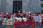 People gather in protest of data centers, advocating for a statewide data center moratorium, in front of the Oregon State Capitol in Salem, Ore., on Sept. 8, 2026.