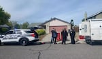 FBI, county and police officials wait for the all-clear to collect evidence at the home of Elias Huizar, 39, where his 17-year-old girlfriend, Angelica Santos, was found dead.