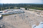 One of the substations and recently unpacked Ant Boxes outside the Merkle Standard cryptocurrency mining facility in Usk, Wash. on Friday, Sept. 9, 2022 (Erick Doxey for InvestigateWest)