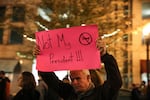 An anti-Trump demonstrator held a hand-made sign reading “Not My President!!!” as hundreds marched through downtown Portland, November 9 2016.