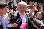 Russian-Armenian tycoon Samvel Karapetyan speaks to the media after voting at a polling station during a parliamentary election in Yerevan, Armenia, Sunday, June 7, 2026.