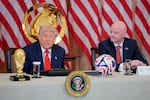 President Trump speaks alongside FIFA President Gianni Infantino during an event for the 2026 World Cup in the East Room of the White House in Washington, D.C., on May 6.