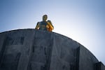 The Oregon Pioneer statue sits atop the Oregon State Capitol in Salem, Ore., on Sept. 8, 2026.