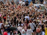 Swifties gather and sing in the city center in Vienna on Thursday. Organizers of three Taylor Swift concerts in the stadium in Vienna this week called them off on Wednesday after officials announced arrests over an apparent plot to launch an attack on an event in the Vienna area such as the concerts.