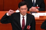Qin Gang takes the oath as Chinese foreign minister during a session of China's National People's Congress at the Great Hall of the People in Beijing on March 12. China removed Qin from the post and replaced him with his predecessor, Wang Yi, in a move that has already fueled rumors over the personal lives and political rivalries of China's Communist Party elite.