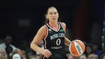Portland Fire guard Carla Leite dribbles the ball against the Phoenix Mercury during the first half of a WNBA basketball game, Sunday, Aug. 16, 2026, in Phoenix.