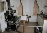 Furniture is being kept within temporary braces inside the Yaquina Bay Lighthouse kitchen.