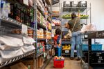 A family gathers food in the community pantry at the Central Texas Food Bank on March 26 in Austin, Texas. The Trump administration's USDA is ending a yearly food insecurity survey.