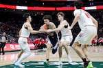 Gonzaga guard Jalen Warley, second from left, drives against Seattle University forward Junseok Yeo, center Austin Maurer, and forward Will Heimbrodt, from left, during the second half of an NCAA college basketball game Saturday, Jan. 17, 2026, in Seattle.