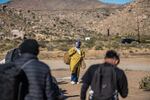 Migrants say Border Patrol tells them that if they leave the camps, they will get deported.
