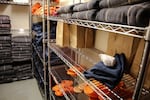 Socks, sandals, clothing and blankets line the shelves of a stock room at the Deschutes County Jail in Bend, Ore., Tuesday, March 12, 2019. In Oregon, jails must comply with a set of statewide standards that govern everything from riot control to a requirement that mattresses and blankets be fire-retardant.