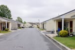 Becca Morris’ apartment of nine years, right, is seen in the Laverty Lane public housing apartment complex in Bridgeville, Delaware on Wednesday, May 14, 2025. (Wesley Lapointe/ for NPR)