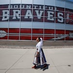 Lemiley Lane, who grew up in the Navajo Nation in Arizona, walks along the Bountiful High School campus during her junior year in 2020 in Bountiful, Utah. The school changed its nickname in 2021 to "The Redhawks."