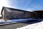 The front entrance to the redbrick Harney District Hospital on a sunny day.