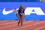 Tara Davis-Woodhall celebrates after winning the women's long jump final during the U.S. Track and Field Olympic Team Trials Saturday, June 29, 2024, in Eugene, Ore.