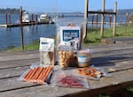 FILE - Local Ocean Seafood's 100% Fish program produces fish skin dog treats, bone broth, fish cookies, fish jerky, and fish sausages from seafood processing scraps.